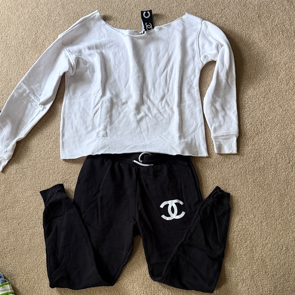 Chic Black Joggers  and coordinating white off shoulder sweatshirt set